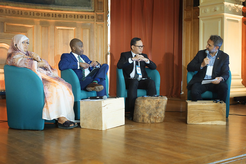 Mayor Bima Arya Sugiarto, Mayor Errick D. Simmons, and Regional Council President Fatimetou Abdel Malick speak with Romain Troublé