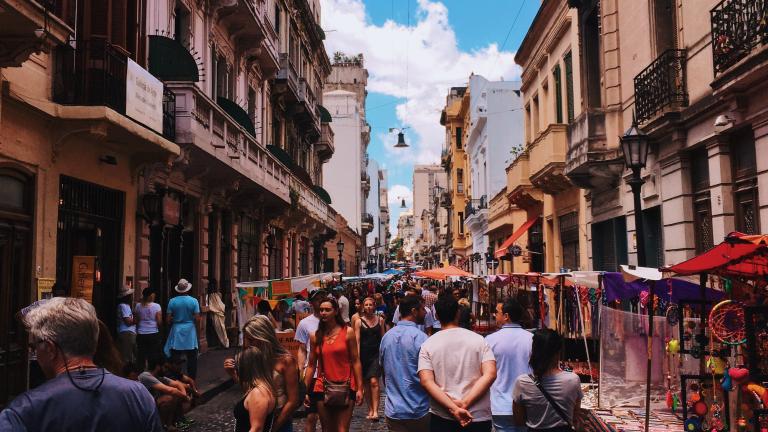 a busy street scene in buenos aires