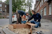 people building a planter in carnisse